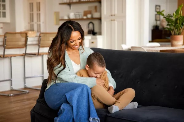 A mother hugging her son in their clean home thanks to Zerorez.
