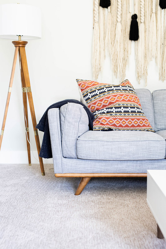 Gray fabric couch in living room looks brand new thanks to Zerorez.